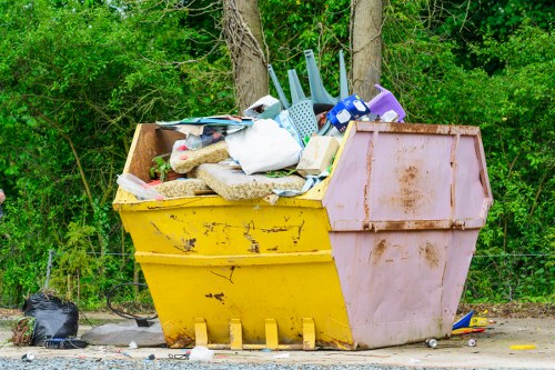 People disposing old furniture responsibly in Northolt